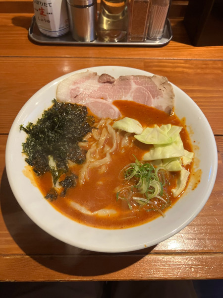 「赤辛らーめん10辛 (大盛り・ピロ麺・麺硬め)」@麺屋 真心の写真