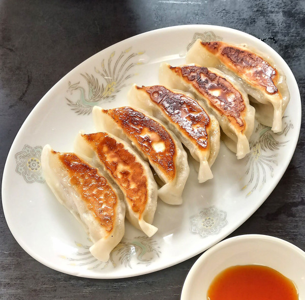 「自家製焼き餃子 480円」@聚香園の写真