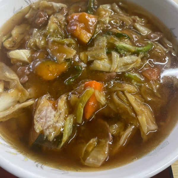 「スタミナラーメン 830円 半ライス 100円」@三四拉の写真