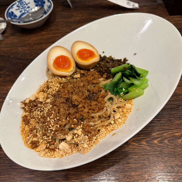 「本場成都の汁なし担担麺・こだわりの醤油漬け半熟たまご」@雲林坊 川口店の写真