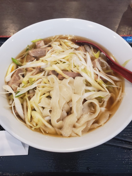 「葱チャーシュー刀削麺」@向陽飯店 大庭店の写真