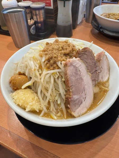 「ラーメン+ウズラニンニク醤油」@豚のトリコの写真