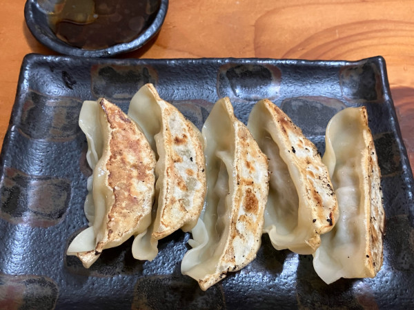 「餃子360円他」@豆でっぽうの写真