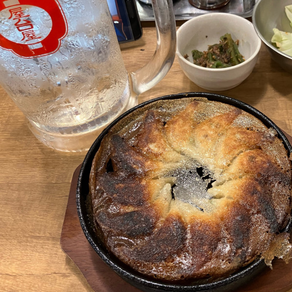 「鉄鍋餃子12個CP無料他」@屋台屋 博多劇場 千葉ニュータウン店の写真