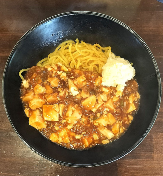「麻婆らーめん 1000円＋にんにく 100円」@台湾担々らーめん 鳴子飯店の写真