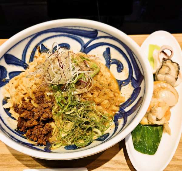 「限定　スパイスと貝出汁の効いた魚介汁なし担々麺」@Fishmenの写真