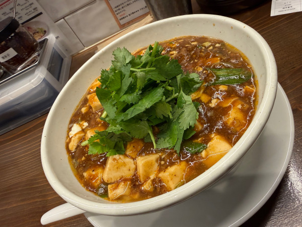 「パクチー麻婆麺」@SHIBIRE NOODLES 蝋燭屋 大宮西口店の写真