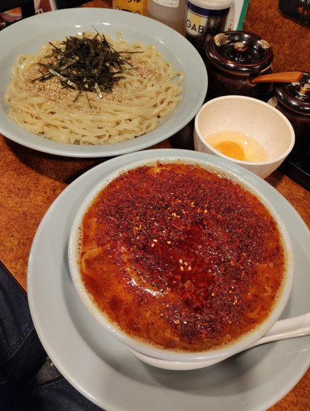 「【未発売メニュー】旨辛つけ麺TP生卵」@麺の蔵 かめだ屋の写真