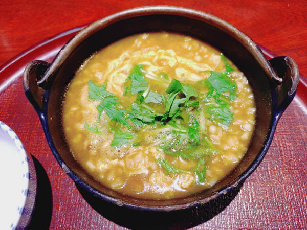 「カレー雑炊　１１２２円」@お通 新宿歌舞伎町店の写真