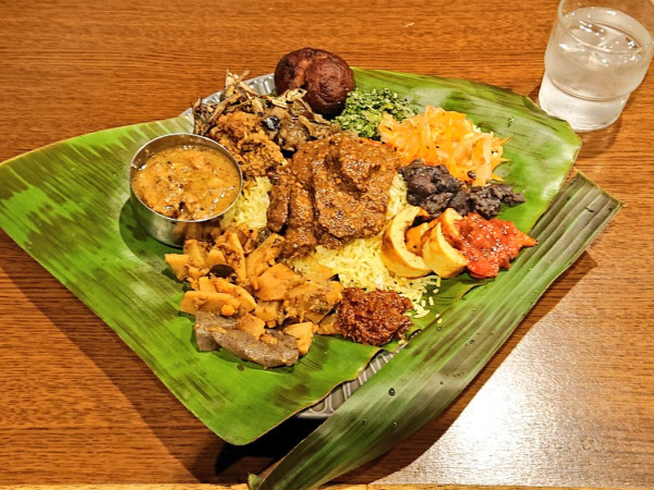 「ターメリッくん×シモカワスパイス おせちカレープレート 4種」@東京間借りカレー シモカワスパイス 新宿店の写真