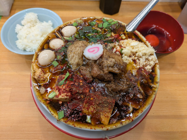「旨辛痺麺(まさお)+ひと口ライス+ポン玉」@らーめん 護什番の写真